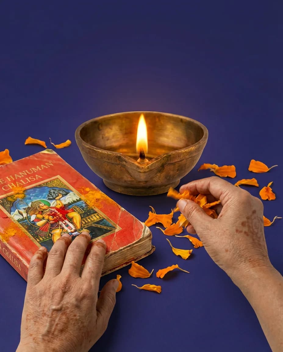 Grandmother explaining the meaning of Ganapataye with expressive hands